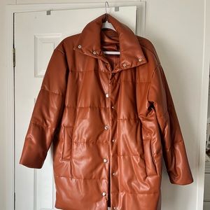 Burnt Orange, Soft leather, puffy jacket. Brand new never used.